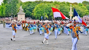 Kontingen Patriot II Indonesia Memukau di Bastille Day 2025